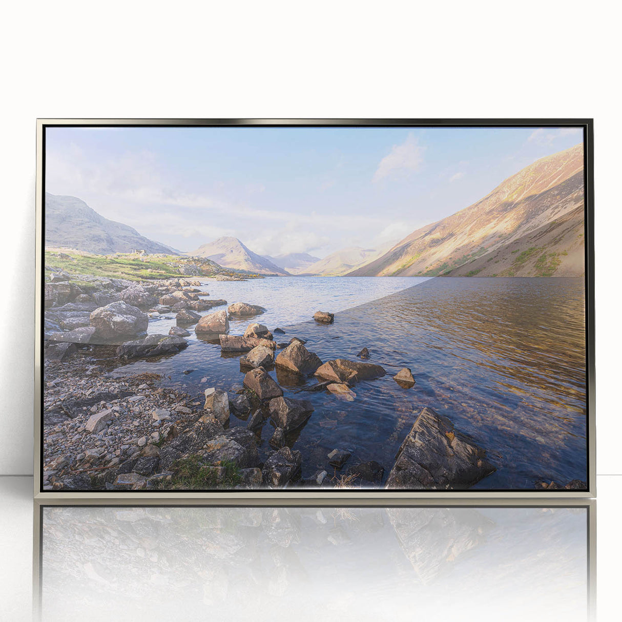 Acrylic print of a serene Cumbria landscape in muted green and blue tones, framed in silver.
