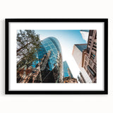 Extra large abstract art print of a colorful, textured London skyline on a black framed canvas, ideal for living room decor.