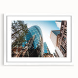 Textured art print of an abstract London skyline in gray and blue tones, framed with a white mat, ideal for bedroom decor.