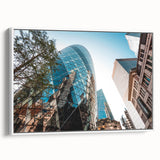 Vintage poster art of London scenery in vibrant colors on a large framed canvas, ideal for living room decor.