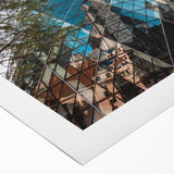 Art deco poster featuring a stylized London skyline in muted blue and gray tones on a rolled canvas.