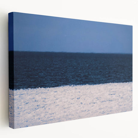 A panoramic view of a European cityscape in muted gray and blue tones on a large stretched canvas.