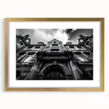 Abstract art print of Rome scenery in muted gold and earth tones on a framed canvas, suitable for dining room decor.