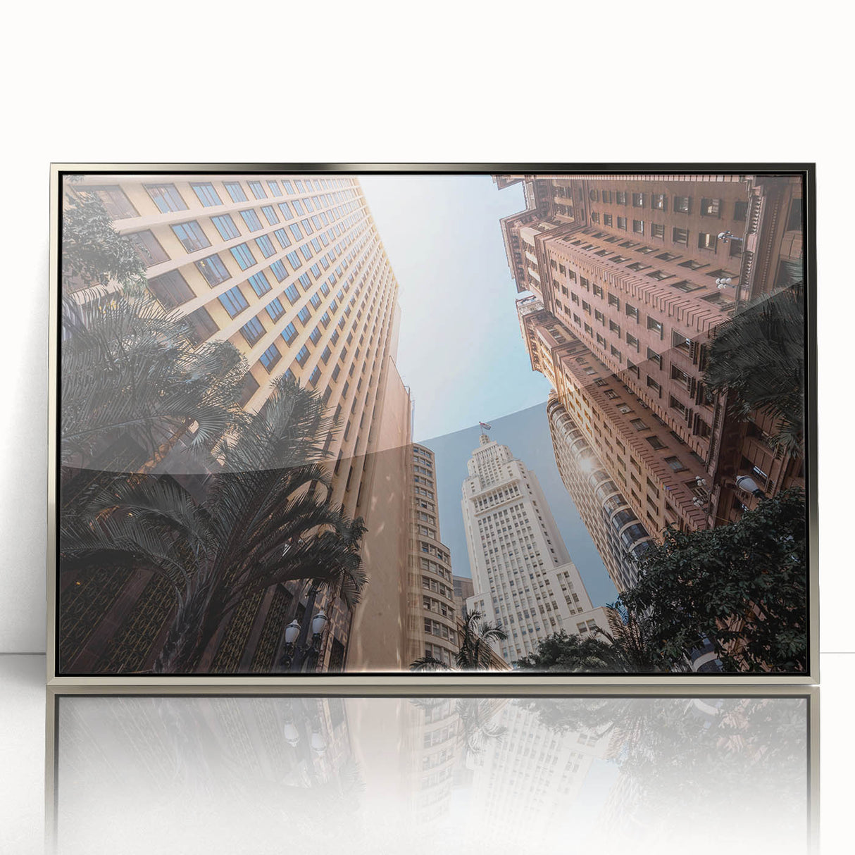 Mid-century modernist art of a Brazilian landscape in muted earth tones, framed in silver acrylic.