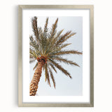 Textured abstract art print in silver frame, featuring swirls in muted gray tones, ideal for bedroom art.