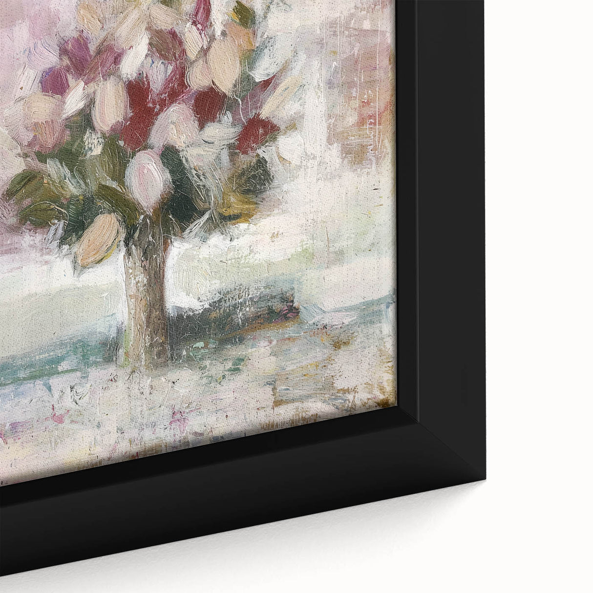 Close-up of an abstract floral framed canvas artwork showcasing vibrant colors like pink, blue, and green, perfect for enhancing modern home decor aesthetics.