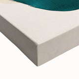 Close-up of a stretched canvas displaying abstract minimalist wall art in muted tones of beige and gray, perfect for modern home decor.