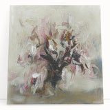 Abstract floral canvas art piece featuring vibrant colors and intricate patterns, leaning against a neutral wall, perfect for home decor or gallery display.