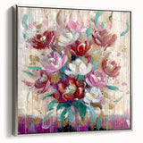 Framed canvas artwork showcasing abstract floral designs in vibrant colors, featuring a sleek silver frame. Ideal for enhancing modern home decor with elegance.