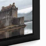 Close-up of a framed canvas depicting a vibrant landscape with a majestic castle, showcasing rich colors and intricate details, perfect for home decor.