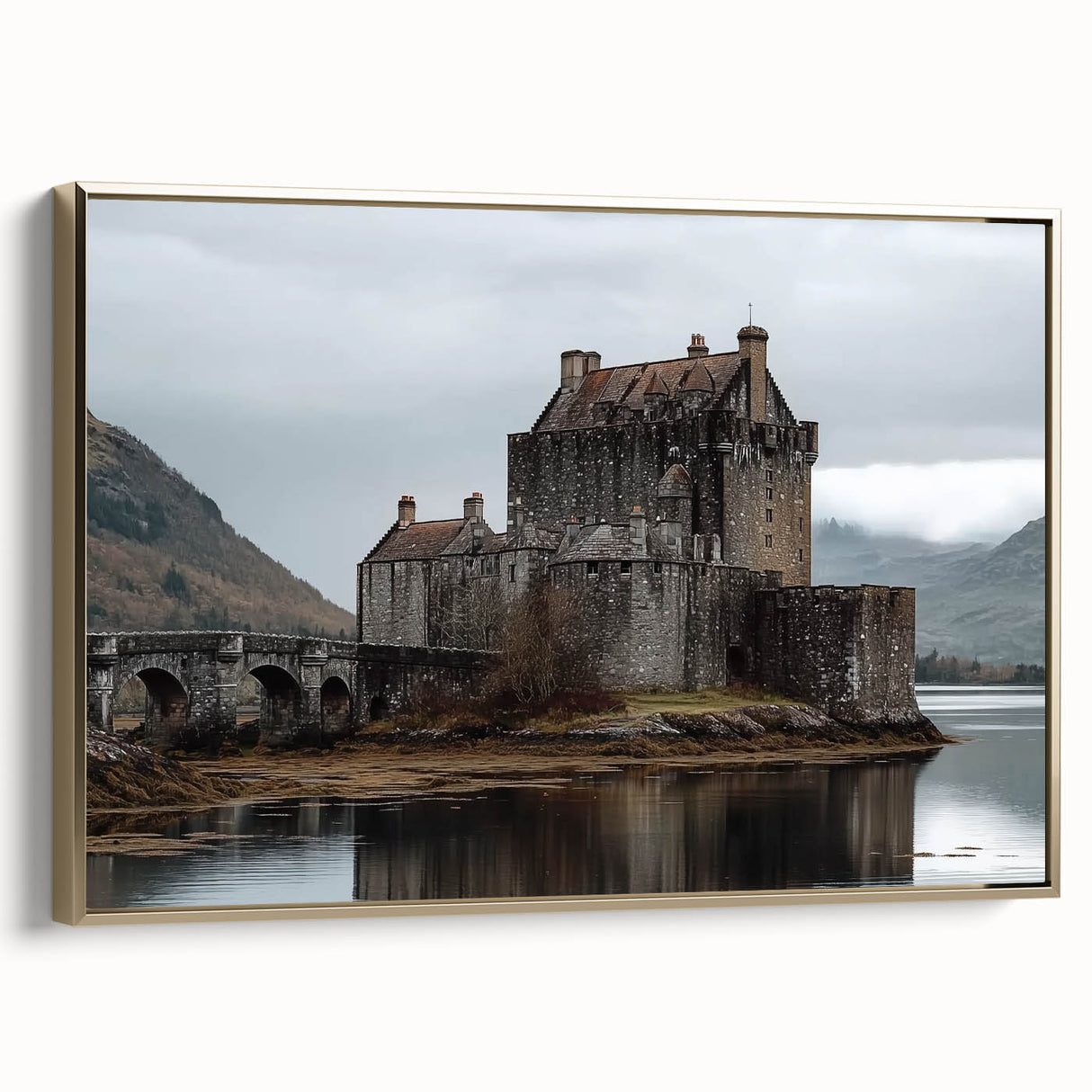 Framed canvas artwork depicting a scenic landscape with a majestic castle, set against a vibrant sunset. The canvas has a gold frame, adding elegance to any decor.