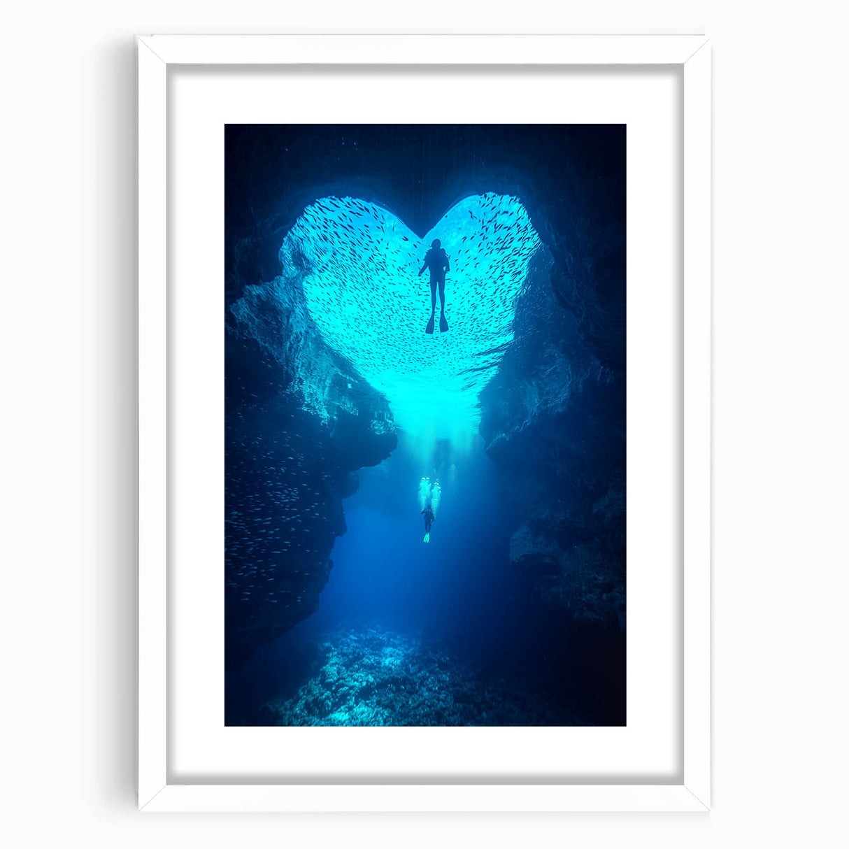 Framed landscape artwork depicting a serene cave scene, featuring natural colors and textures with a white mat, perfect for home decor and interior design.