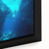 Close-up of a framed canvas artwork depicting a serene cave landscape, showcasing detailed textures and earthy tones, perfect for nature-inspired decor.