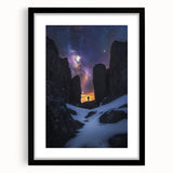 Black-framed landscape artwork featuring dramatic cliffs and a serene ocean view, enhanced with a white mat for an elegant presentation, ideal for modern home decor.