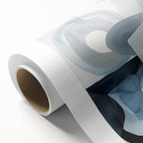 Abstract geometric rolled canvas artwork showcasing vibrant colors and intricate shapes, elegantly packaged in a protective cardboard tube, ideal for modern home decor.