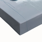 Close-up of a vibrant abstract splatter design on stretched canvas, showcasing bold colors and unique textures, perfect for modern home decor or artistic displays.