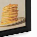 Close-up of black wall art featuring colorful pastries on a textured, framed canvas, suitable for large living room decor.