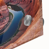 Close-up view of a vibrant acrylic glass artwork depicting a stunning landscape of canyons, showcasing rich colors and intricate details, perfect for home decor.