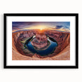 Landscape art print showcasing dramatic canyons framed in black with a mat, ideal for modern home decor, emphasizing natural beauty and artistry.