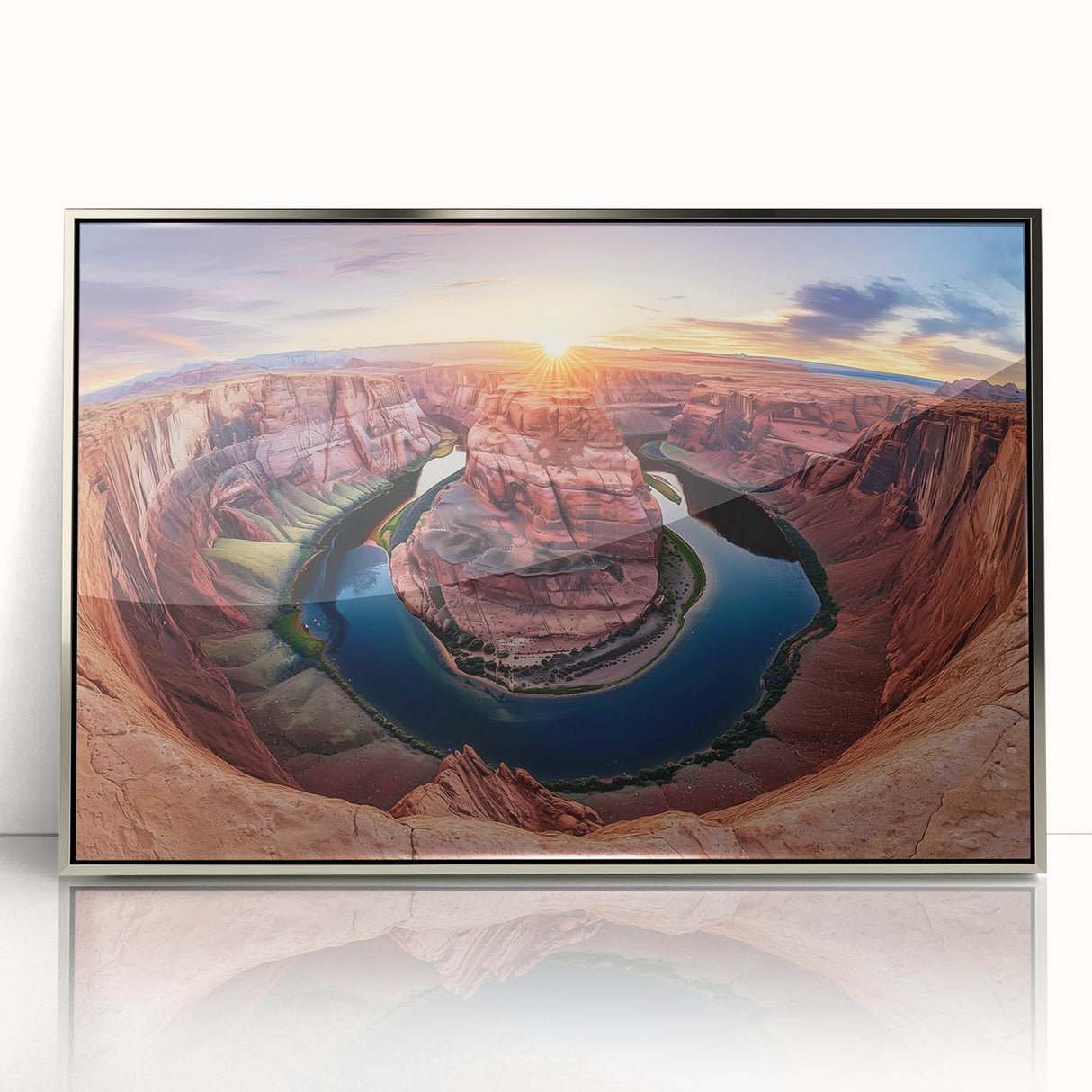 Framed acrylic landscape artwork showcasing vibrant canyons in shades of orange and blue, elegantly displayed with a sleek silver frame, perfect for modern home decor.