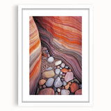 Desert landscape framed art with a white mat, showcasing vibrant hues of orange and yellow sunsets over sand dunes, perfect for home decor.