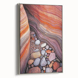 Framed canvas artwork showcasing a vibrant desert landscape with rich warm tones and detailed textures, accented by a sleek silver frame for a modern touch.