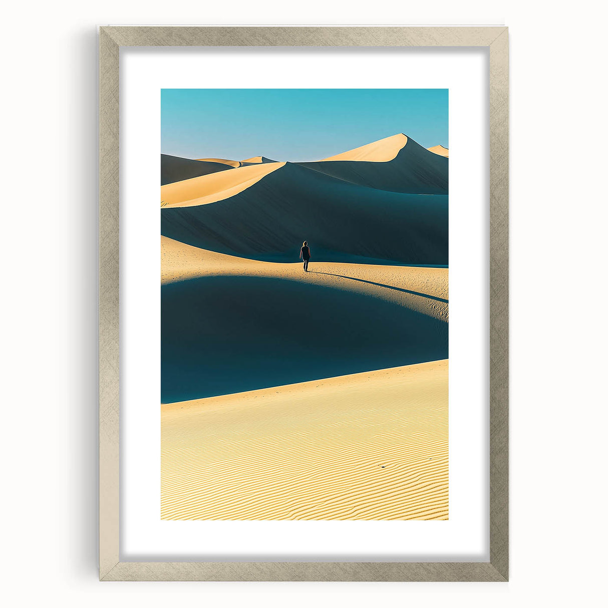 Framed landscape art showcasing tranquil sand dunes with a silver mat, perfect for home decor. This elegant piece adds a serene touch to any room's ambiance.