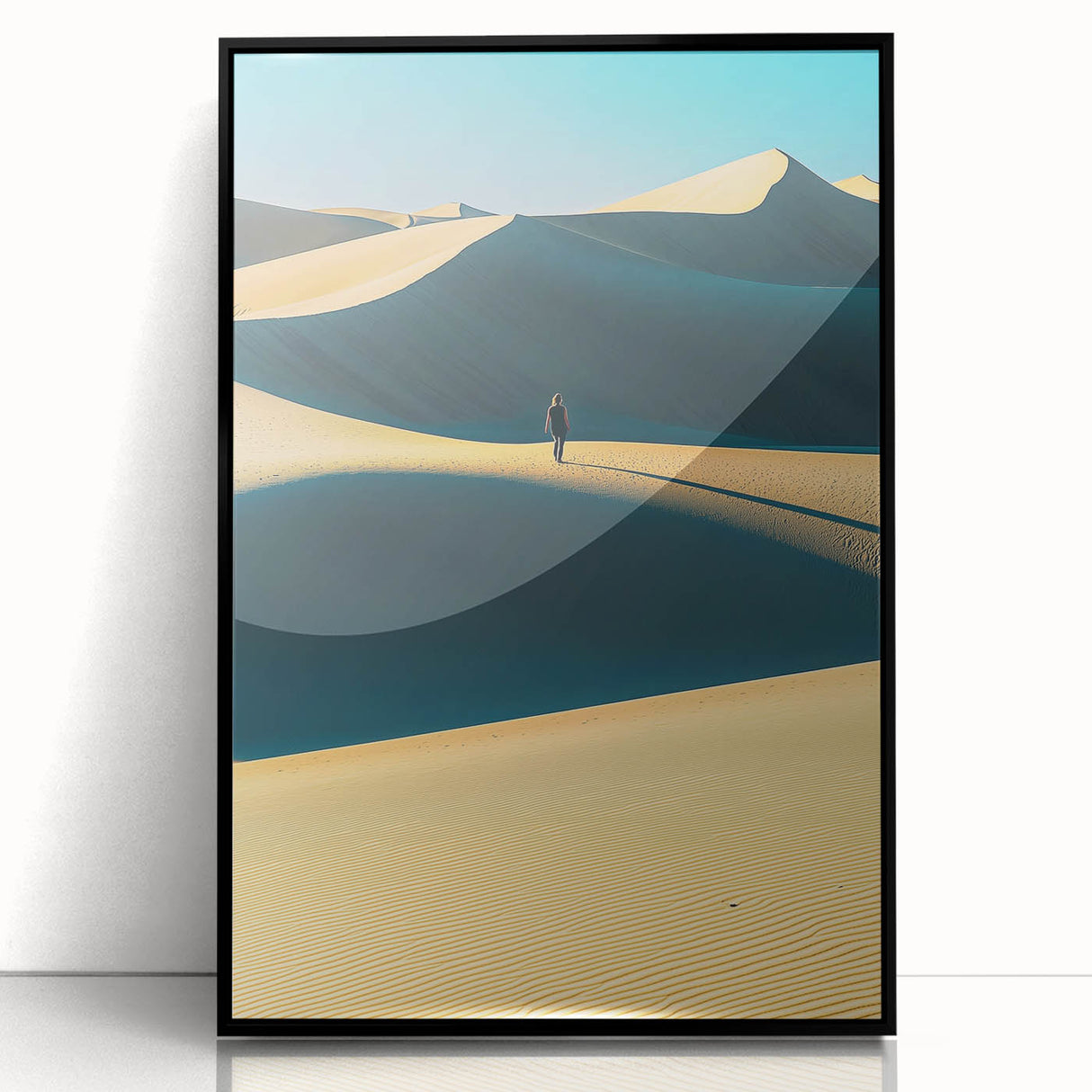 Framed acrylic artwork showcasing serene sand dunes in a minimalist black frame, adding a modern touch to home decor. Perfect for nature lovers seeking tranquil landscapes.