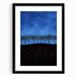 Black-framed landscape artwork featuring vibrant green fields and a serene blue sky, elegantly matted for a polished look, ideal for home decor enhancement.