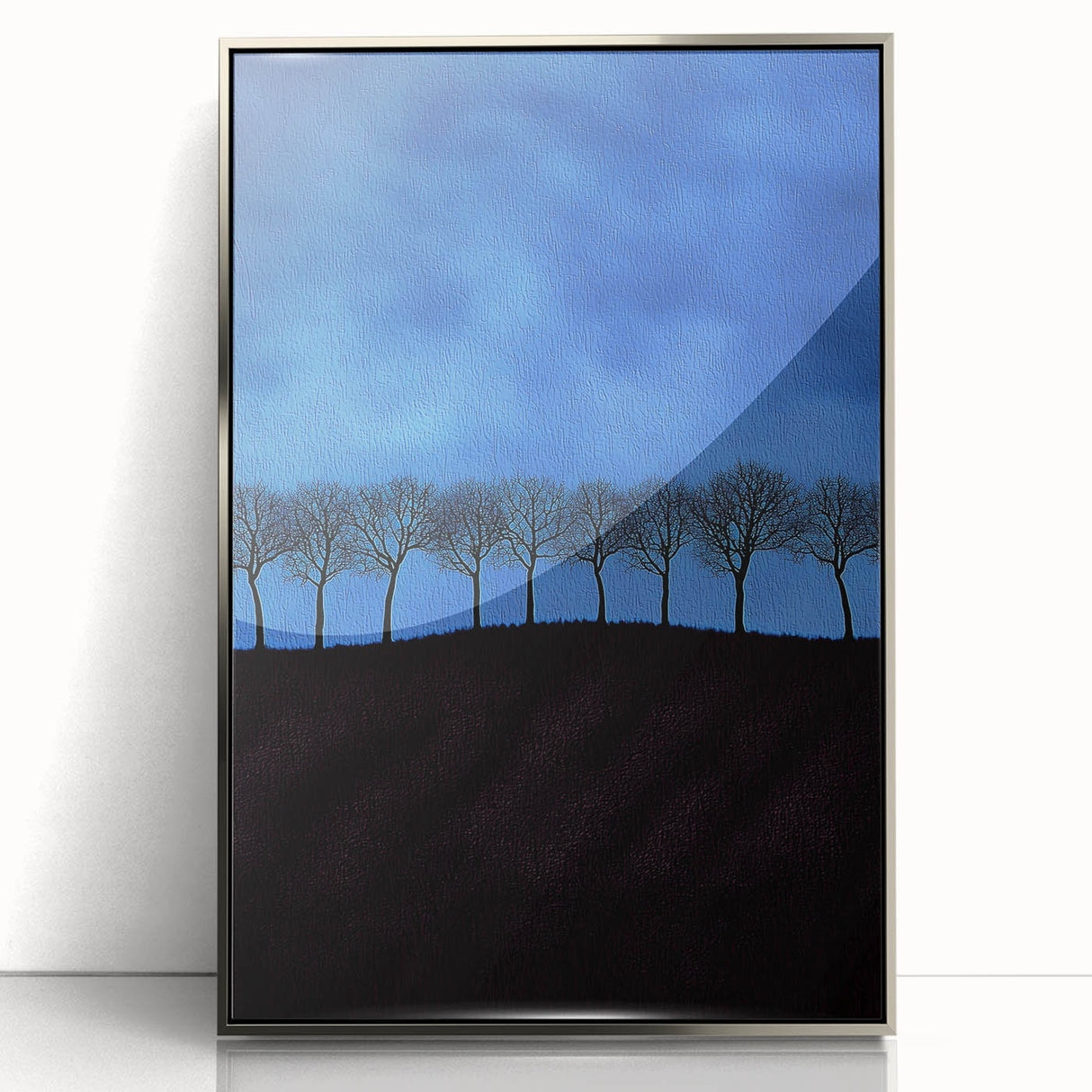 Framed acrylic artwork showcasing a vibrant landscape of rolling fields in shades of green and gold, presented in a sleek silver frame that enhances its natural beauty. Perfect for home decor, this piece adds a touch of elegance to any space with its serene and inviting scenery.