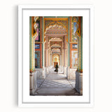 Abstract art print featuring a stylized Indian landscape in muted earth tones, framed with a white mat.