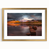Abstract art print depicting the serene Cumbria landscape in muted green and blue tones, framed in gold.