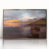 Art deco poster depicting the Cumbria, England scenery in muted earth tones on a gold-framed acrylic.