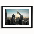 Colorful abstract art print of London scenery on textured canvas, framed in black, ideal for living room decor.