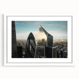 Textured art of abstract London skyline in muted gray and blue tones, framed with a white mat, ideal for bedroom wall decor.