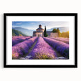 Colorful abstract art print of a Provencal landscape with textured brushstrokes on a large framed canvas.