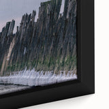 Extra large framed canvas featuring a textured depiction of a European Lithuanian landscape in black with colorful accents.