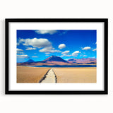 Abstract art print of a Bolivian landscape in vibrant colors on a large framed canvas, suitable for living room decor.