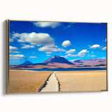 Framed canvas wall art featuring a vintage-style landscape painting of a Bolivian scenery in black and gold tones.