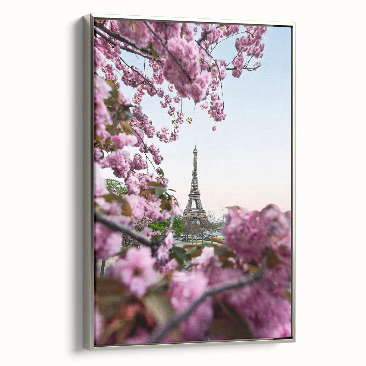 Framed canvas featuring a colorful spring landscape painting with vintage poster art influences.