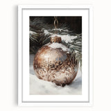 Abstract art print depicting a winter scene in muted blue and white tones, framed with a white mat.