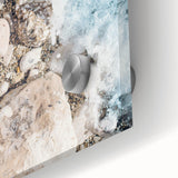 Large abstract wall art in vibrant orange and blue tones on acrylic glass, suitable for dining room ambiance.