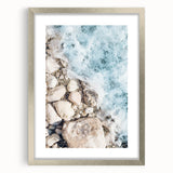 Textured abstract art print in cool blue and gray tones on a framed canvas, suitable for bedroom wall decor.