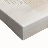 Close-up view of a stretched canvas featuring abstract minimalist wall art, highlighting soft, muted colors and geometric shapes, perfect for modern home decor.