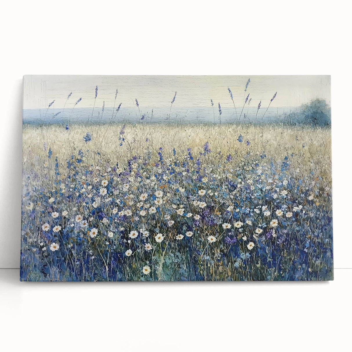 Abstract floral canvas art featuring vibrant hues of blue, pink, and green, elegantly leaning against a textured wall, perfect for modern home decor.