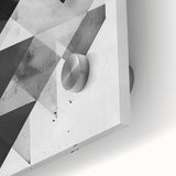 Close-up of minimalist abstract wall art featuring soft pastel colors and geometric shapes on acrylic glass, perfect for modern home decor.