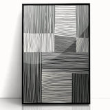 Framed abstract minimalist wall art showcasing a sleek black design, with an acrylic finish that enhances its modern aesthetic, perfect for contemporary decor.