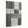 Abstract minimalist wall art canvas featuring vibrant geometric shapes in shades of blue and orange, elegantly stretched for display, showcasing a modern artistic flair.