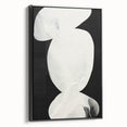Framed abstract minimalist wall art featuring a black design, viewed from the side, adding a modern touch to any decor. Ideal for contemporary interiors.