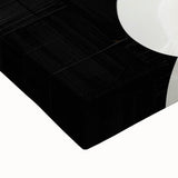 Close-up of vibrant abstract minimalist wall art on stretched canvas, showcasing bold geometric shapes in shades of blue and gold, perfect for modern decor.